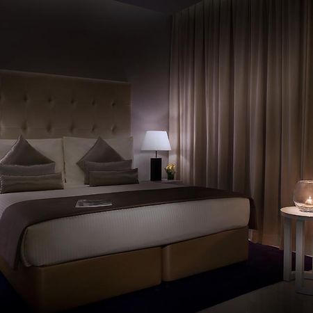 Damac Maison The Vogue Dubai Ngoại thất bức ảnh A bedroom at the hotel