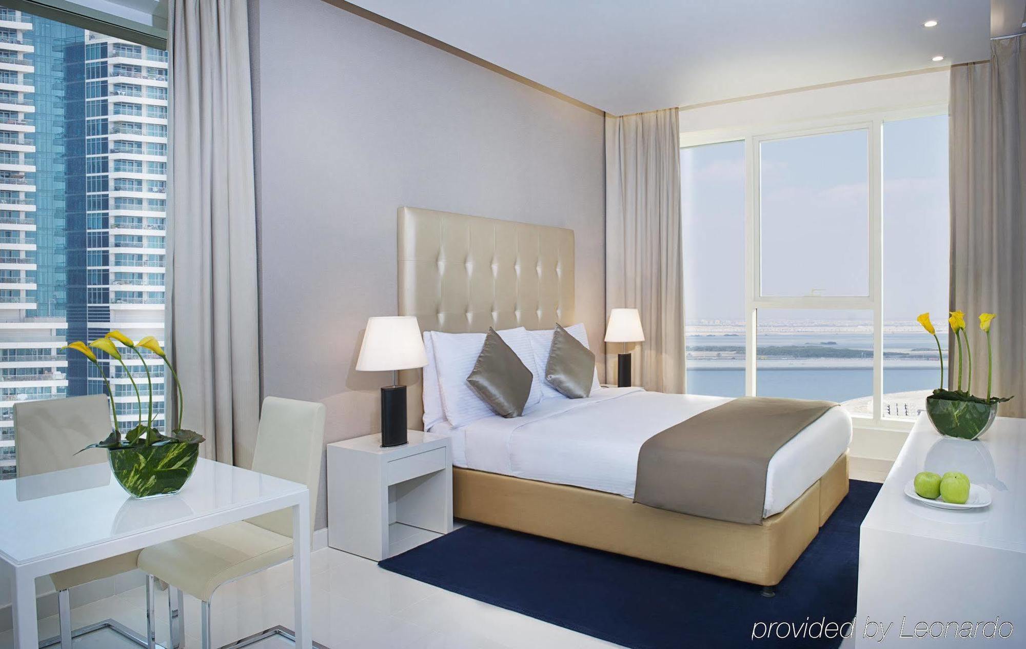 Damac Maison The Vogue Dubai Ngoại thất bức ảnh A bedroom at the Address Downtown Hotel