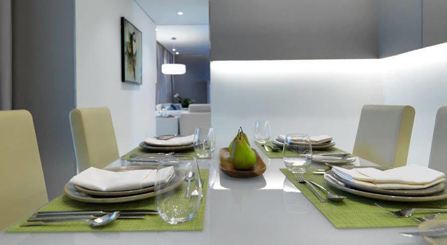 Damac Maison The Vogue Dubai Ngoại thất bức ảnh A table set for a meal